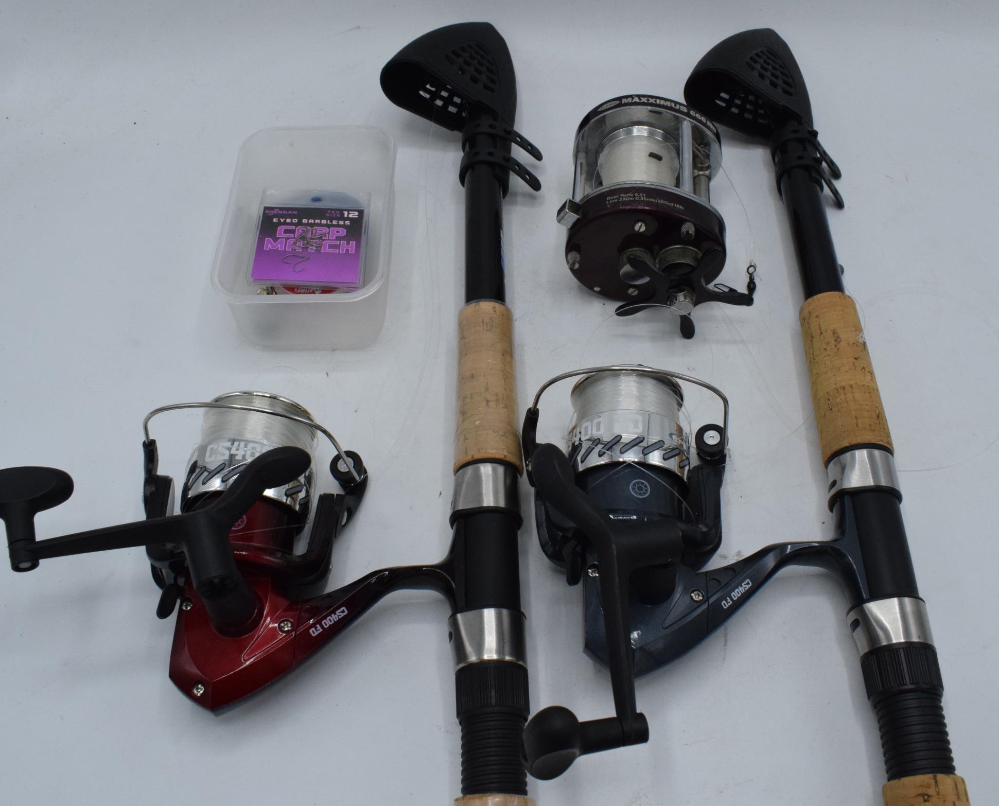 A collection of fishing equipment to include Maxximus 666NB reel, Crane CS400 FD, Crane CS400 FD and