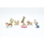 A collection of Wade to include a corgi pen holder, dog with basket, 2 monkeys, Peg, Lady, Jock,