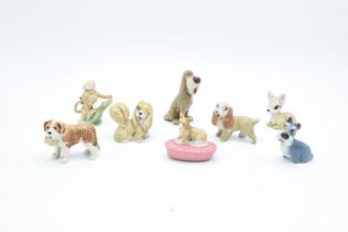 A collection of Wade to include a corgi pen holder, dog with basket, 2 monkeys, Peg, Lady, Jock,