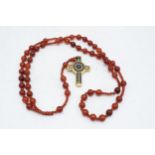 Royal Crown Derby Imari Rosary Cross pendant set on an orange-beaded necklace, complete with box. As