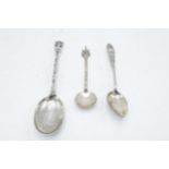 A collection of spoons to include a Paul Orr Madras Indian silver serving spoon, Selangor preserve