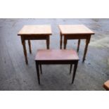 A pair of late 20th century thick pine topped tables together with a piano stool with folding top.