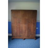 Early 20th century wooden triple wardrobe with decoration to panels. 154 x 48 x 187cm tall. In