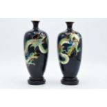 Pair of Japanese cloisonné enamel vases showing coloured dragons on a black background. No obvious