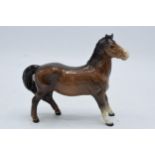 Beswick brown girls pony 1483. In good condition with no obvious damage or restoration.