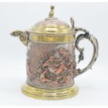 A Victorian Henry Bourne silver plated beer jug in a Bacchanalian design featuring mythological