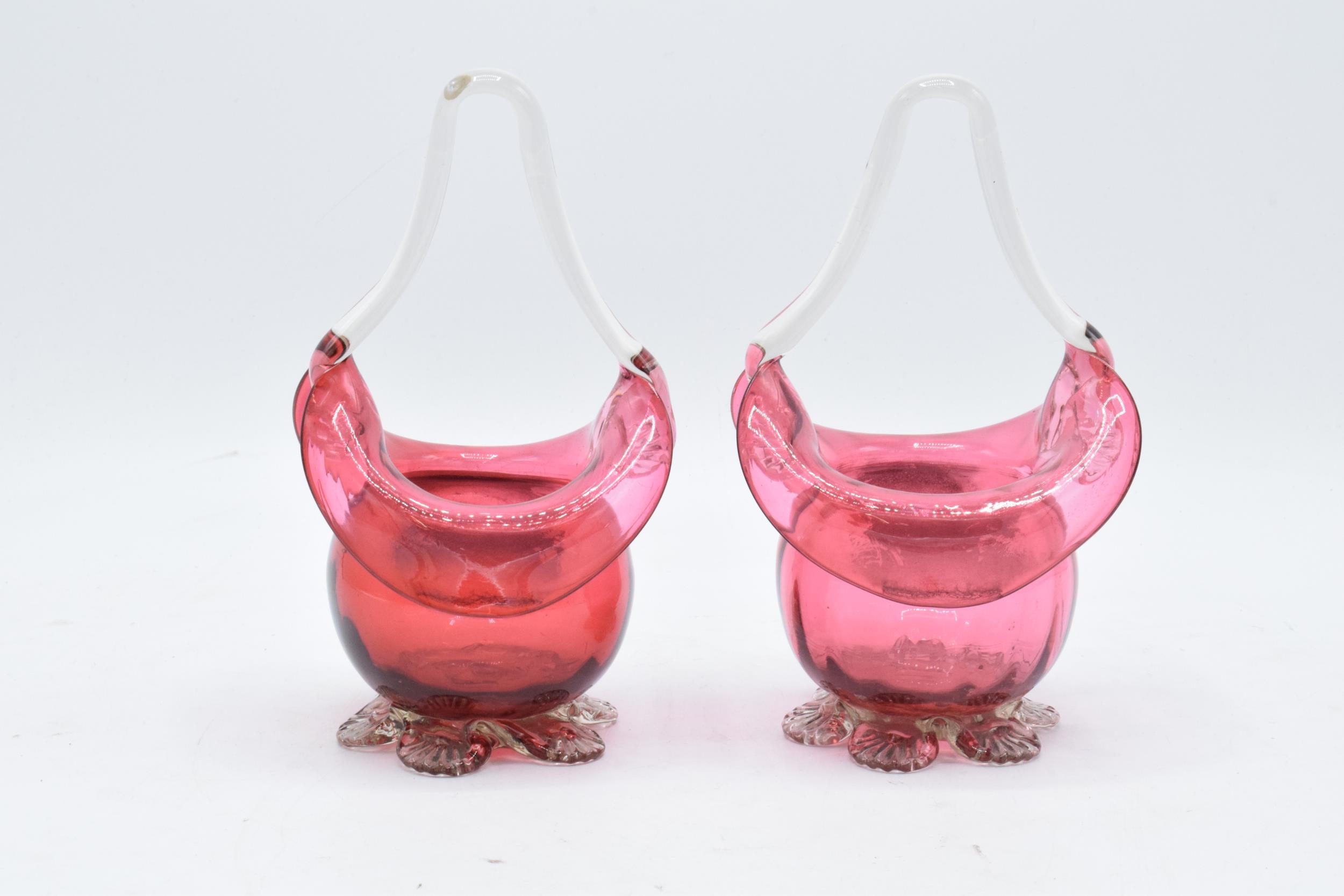 A pair of cranberry glass baskets with handle. Pontil marks to bases. 16m tall. In good condition. - Image 5 of 5