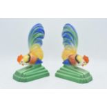A pair of Falcon Ware pottery bookends in the form of Cockerels (2). In good condition with no