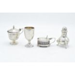 A collection of silver to include matched cruets and a small beaker (4). 181.9 grams of silver.