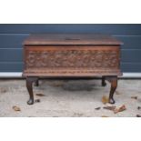 A late 18th / 19th century oak bible box raised on cabriole style legs with heavy carved