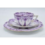 Wileman and Co Foley china (pre Shelley) trio to consist of a shaped cup, saucer and side plate (