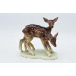 A 20th century German porcelain figure of a pair of deer. 2215. Good detailing and quality. In