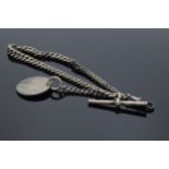 Silver Albert watch chain with T bar, clip and coin fob. 40.6 grams. 36cm long.