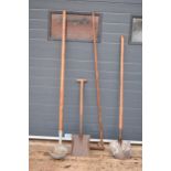 Agricultural interest: a collection of farming and gardening tools to include a spade, a shovel, a