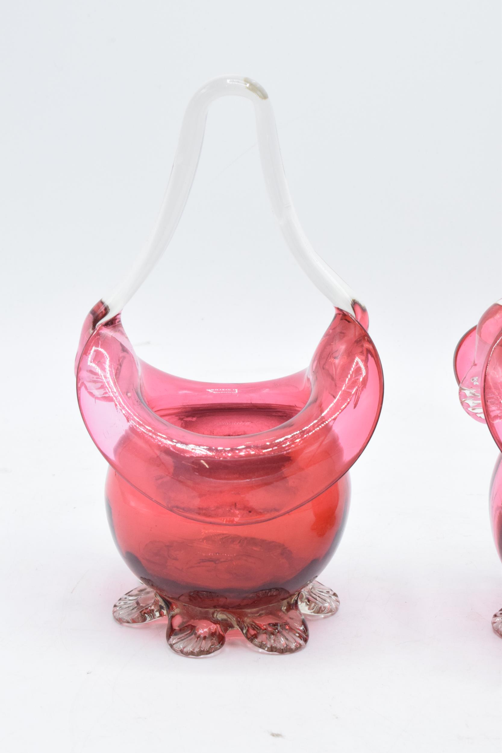 A pair of cranberry glass baskets with handle. Pontil marks to bases. 16m tall. In good condition. - Image 3 of 5