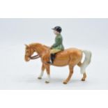 Beswick boy on pony 1500. In good condition with no obvious damage or restoration though head has