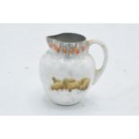 Royal Doulton miniature seriesware jug depicting sheep in a wintery scene. 6cm tall. In good