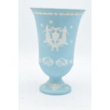 An unusual Wedgwood Jasperware vase in a light blue / aqua blue colour with traditional scenes. 19cm