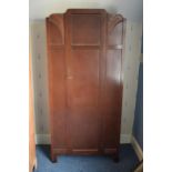 Early to Mid 20th century wooden single wardrobe with carved decoration. 86 x 43 x 187cm tall. In