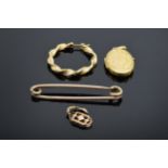 A collection of 9ct gold items to include an earring, a pin, a locket and some scrap. 6.3 grams.