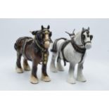 Beswick 818 shires to include a brown and a grey example both in full working harnesses (2). In good