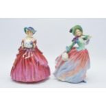 Royal Doulton figures to include Autumn Breezes HN1911 and Genevieve (af) . In good condition with
