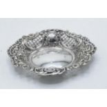 A silver ornate dish with pierced decoration. 85.2 grams. Birmingham 1970. 16cm long.