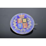 A Victorian 1874 enamelled half crown brooch.