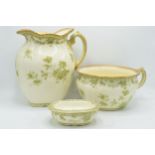 A collection of Powell, Bishop and Stonier (P B S) pottery to include a jug, a guzzunder and a