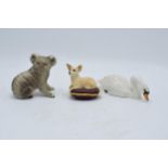 A collection of Beswick to include a koala bear 1038, chihuahua on cushion 2454 and swan with head