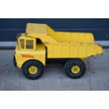 A retro large Tonka dumper truck / tipping truck. 48cm long.