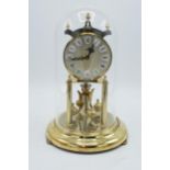 A 20th century anniversary clock with dome made by Kieninger & Obergfell with key. Appears to be