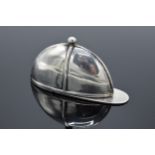 A novelty sterling silver vesta case in the form of a jockey's hat. 15.4 grams.