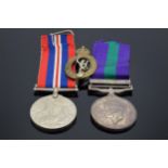A collection of militaria to include George VI silver Palestine 1945-48 medal and ribbon awarded