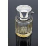 A silver topped scent bottle Birmingham 1907. Missing stopper.
