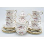 A Paragon tea set in the Victoriana Rose design to include a teapot, 6 cups, 6 saucers, 6 side