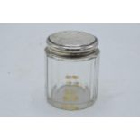 A silver topped glass jar. Chester 1901. 11.6 grams of silver.