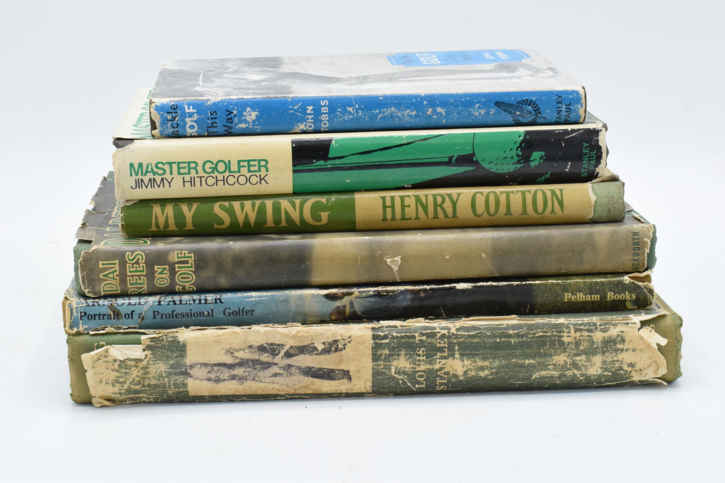 A collection of golf books to include titles such as Swing to Better Golf and My Swing (some damp