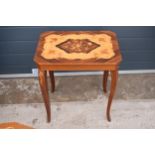Italian style inlaid wooden sewing table with fold up lid and sewing contents. 52 x 39 x 58cm. In