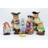 A collection of Toby jugs to include Melba Ware Punch and Judy, Burleigh Ware Sairey Gamp,