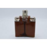 Scandinavian silver and glass hipflask with a leather cover. 14cm tall.