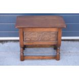 A mid 20th century small carved wooden chest. 57 x 34 x 48cm tall. In good clean condition with some