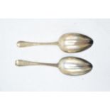 A pair of George III silver table spoons with beaded edge (2). London 1787. John Wren. 127.1 grams.