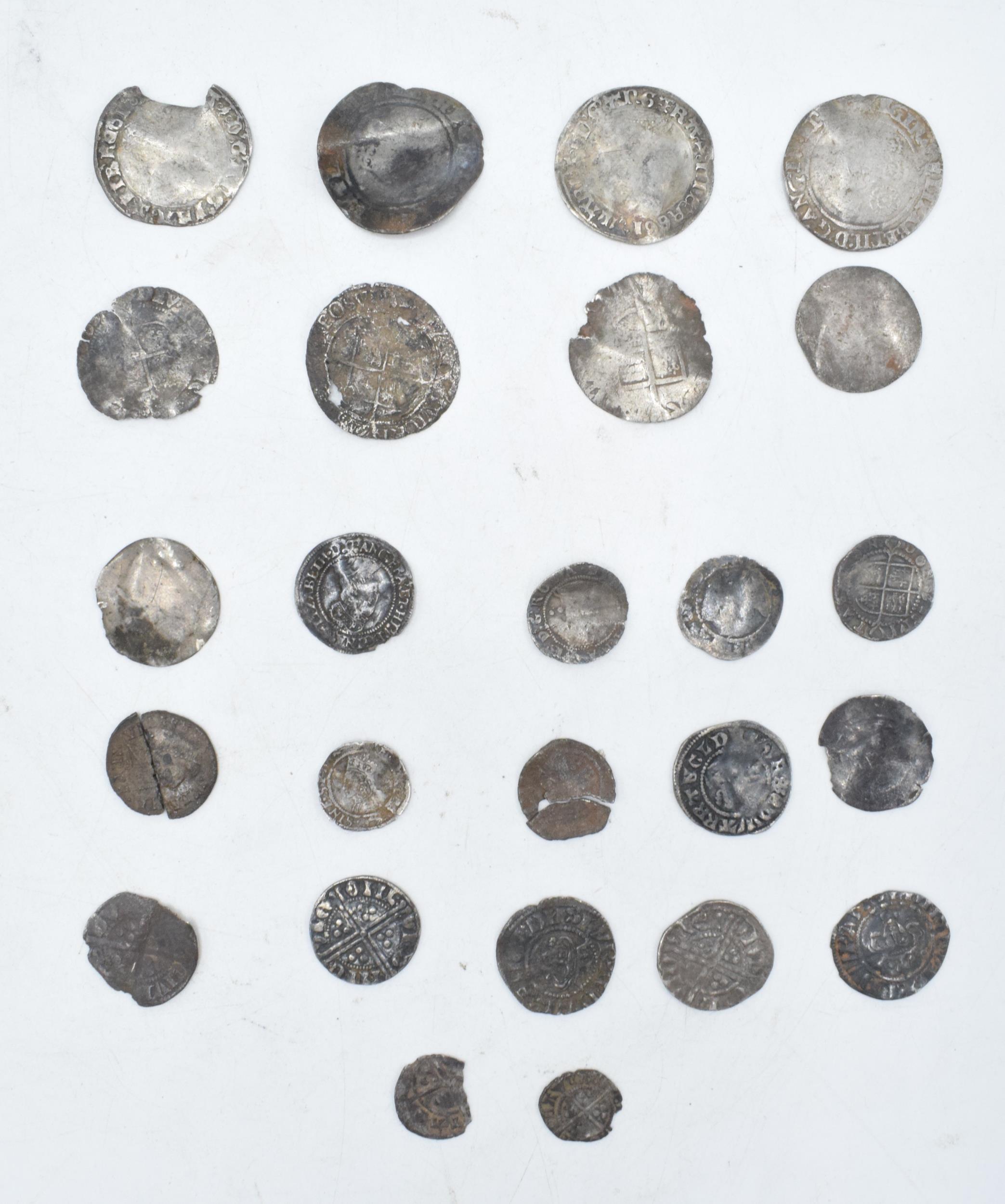 A collection of antique hammered silver coins to include Elizabeth I examples and others in