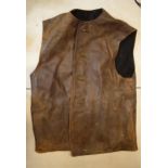 A gent's leather gilet (Jenkins Leather No. 2 Camouflaged), brown with black lining and button