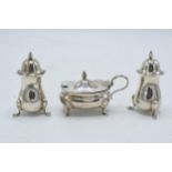 A 3-piece cruet set with blue liner. 95.6 grams of silver. Birmingham 1909.