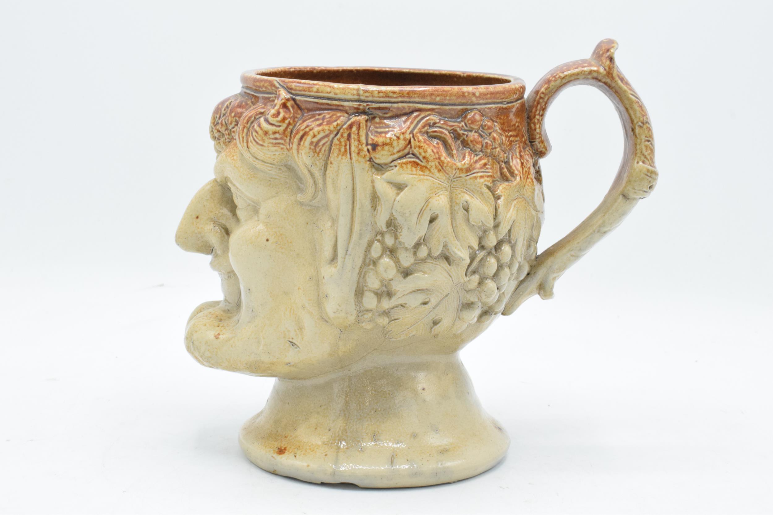 A 19th century stoneware character jug in the form of Bacchus. 19cm tall. Generally in good - Image 4 of 10