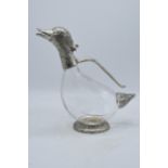 A novelty silver plate mounted glass claret jug modelled in the form of a duck with hinged lid. 27cm