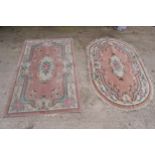 A pair of 20th century rugs in an oriental style (2). largest approx 150 x 92cm. Generally in