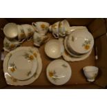 A collection of tea ware in a yellow floral pattern made by Hostess Tableware. Generally in good